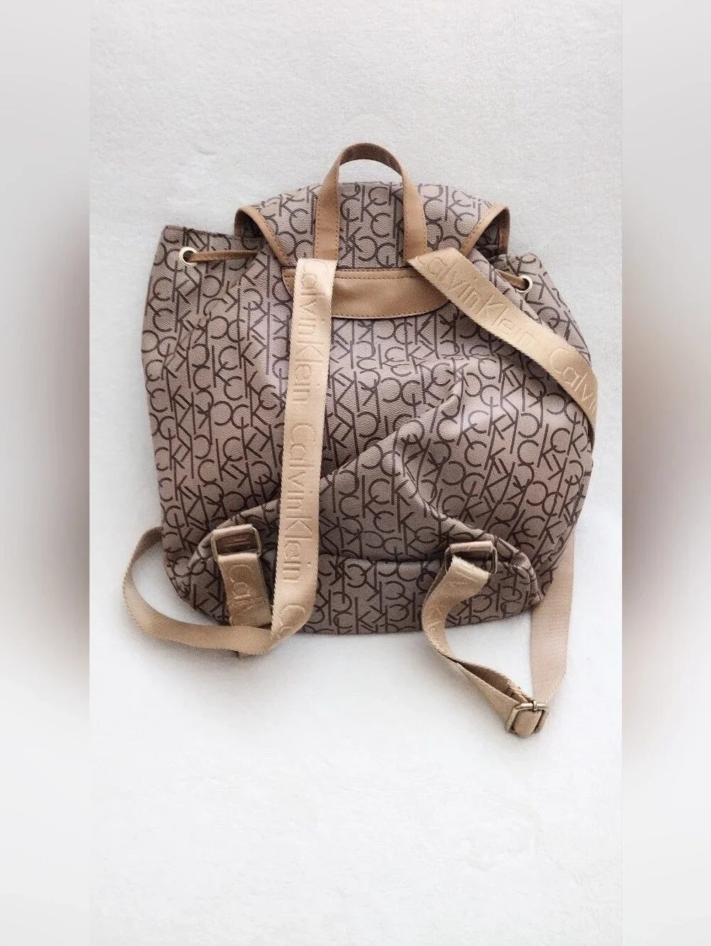 Calvin Klein Monogram Drawstring Backpack in Beige and Brown